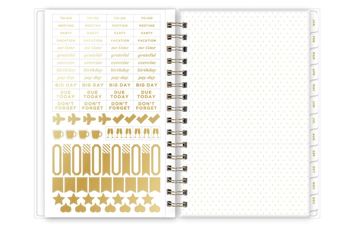 Planner with gold stickers on a white background