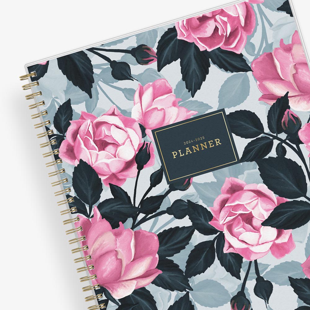 weekly monthly academic planner featuring a pink roses, shaded rose pedals, gold twin wire-o binding, and a compact 8.5x11 planner size
