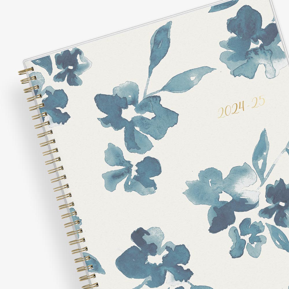 academic weekly monthly planner featuring a white background and blue paint brush florals, twin wire-o binding in a 8.5x11 planner size for the school year 2024-2025 year