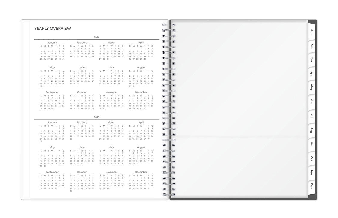 Open planner showing a yearly overview with a white background for 2026 and 2027 with storage pocket