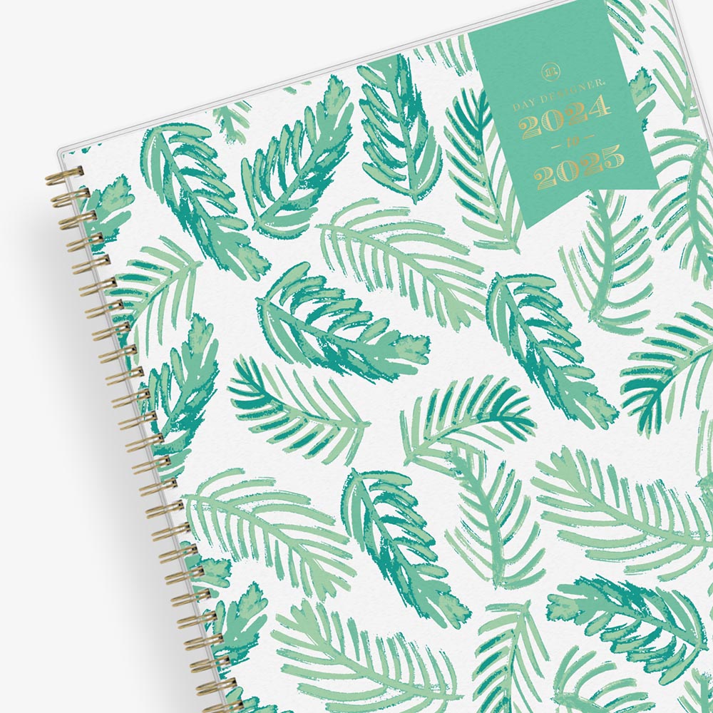 weekly and monthly day designer planner for blue sky featuring palms front cover silver wire-o binding in a 8.5x11 planner size Day Designer 2024-2025