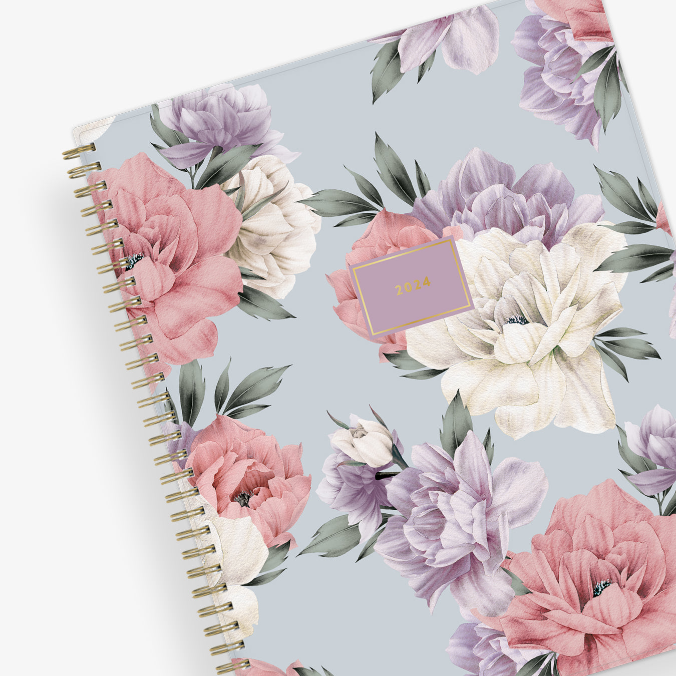 2024 weekly monthly planner featuring floral pattern and gold twin wire-o binding in 8.5x11 planner size