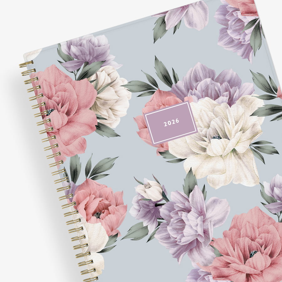 2026 weekly monthly planner featuring floral pattern and gold twin wire-o binding in 8.5x11 planner size