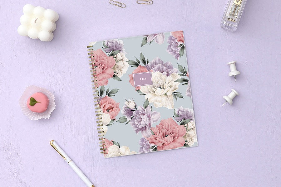 2026 weekly monthly planner featuring floral pattern and gold twin wire-o binding in 8.5x11 planner size