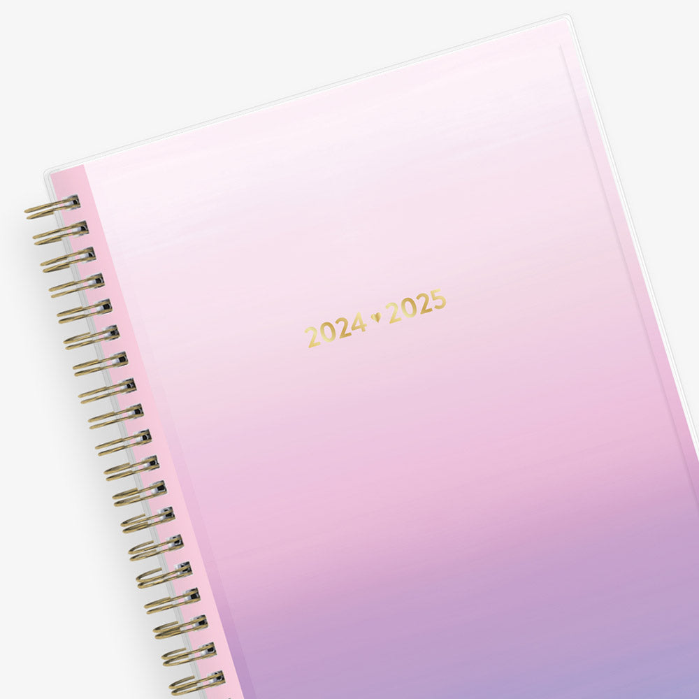 This planner notes dated July 2024-2025 has a purple ombre front cover