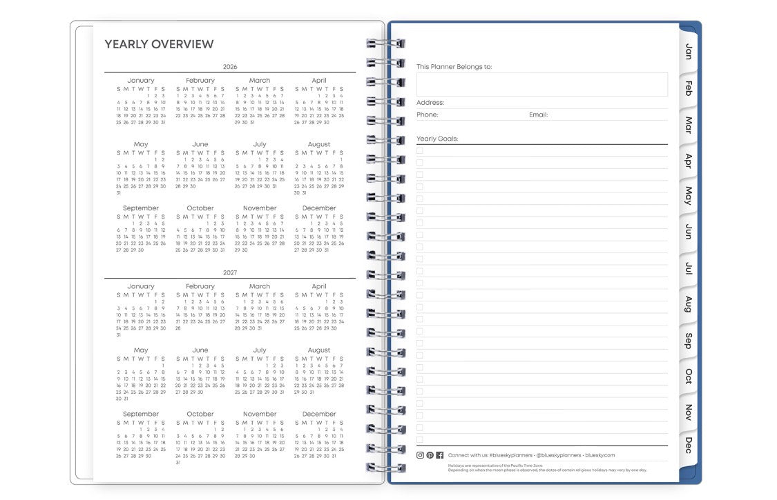 Spiral-bound planner with yearly overview on a white background 2026 and 2027