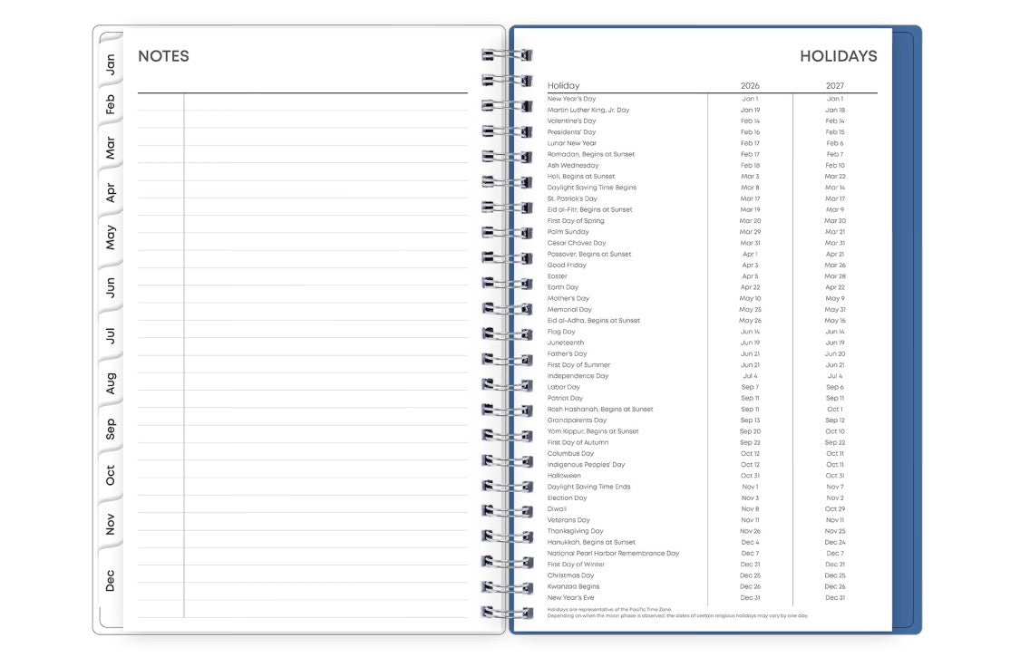 Spiral-bound planner with a lined notes page and a list of holidays on the other, on a white background.