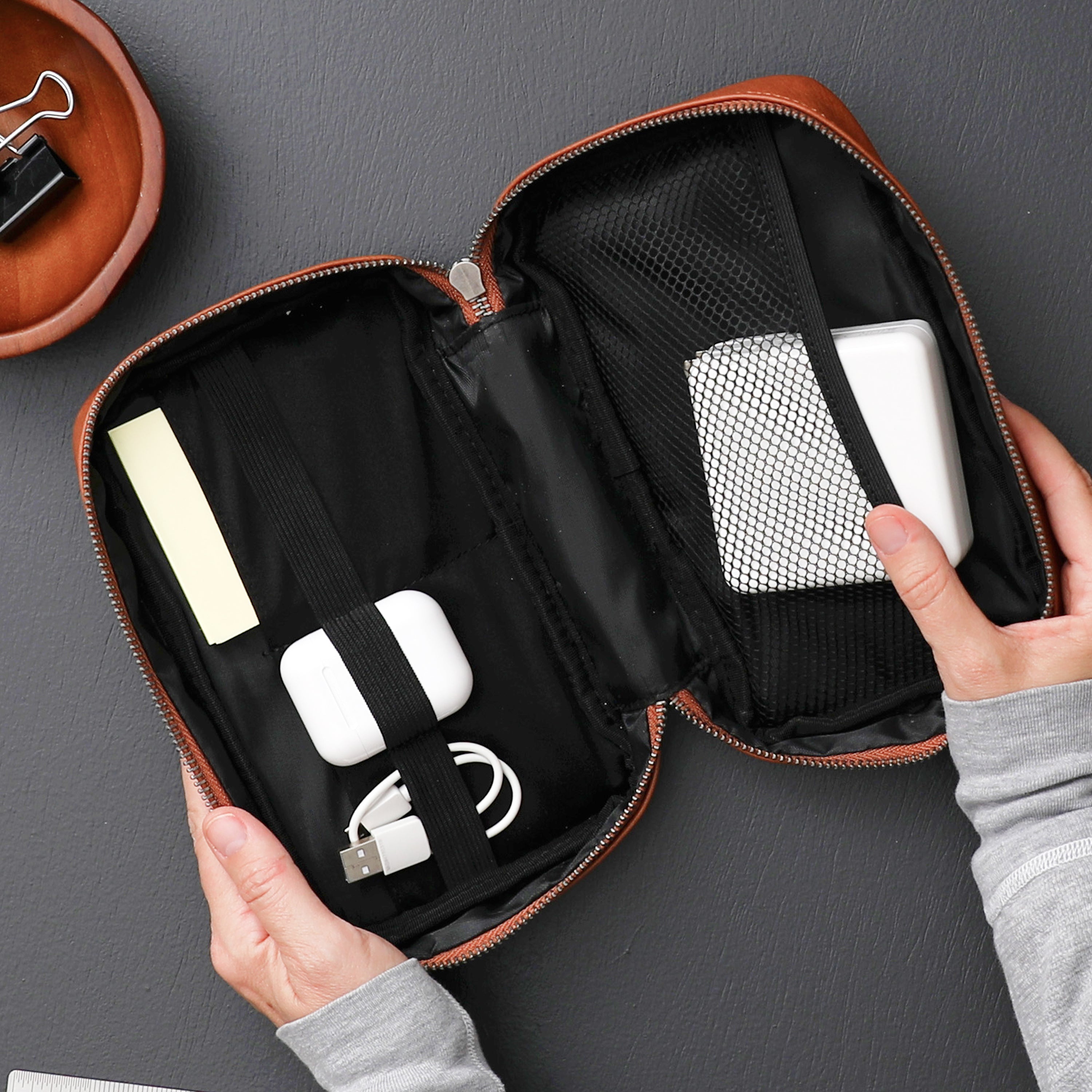 tan faux leather tech organizer, multiple pockets, mesh and elastic holders