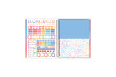the livewell planner comes with sticker sheet, storage pocket, and rainbow colored tabs
