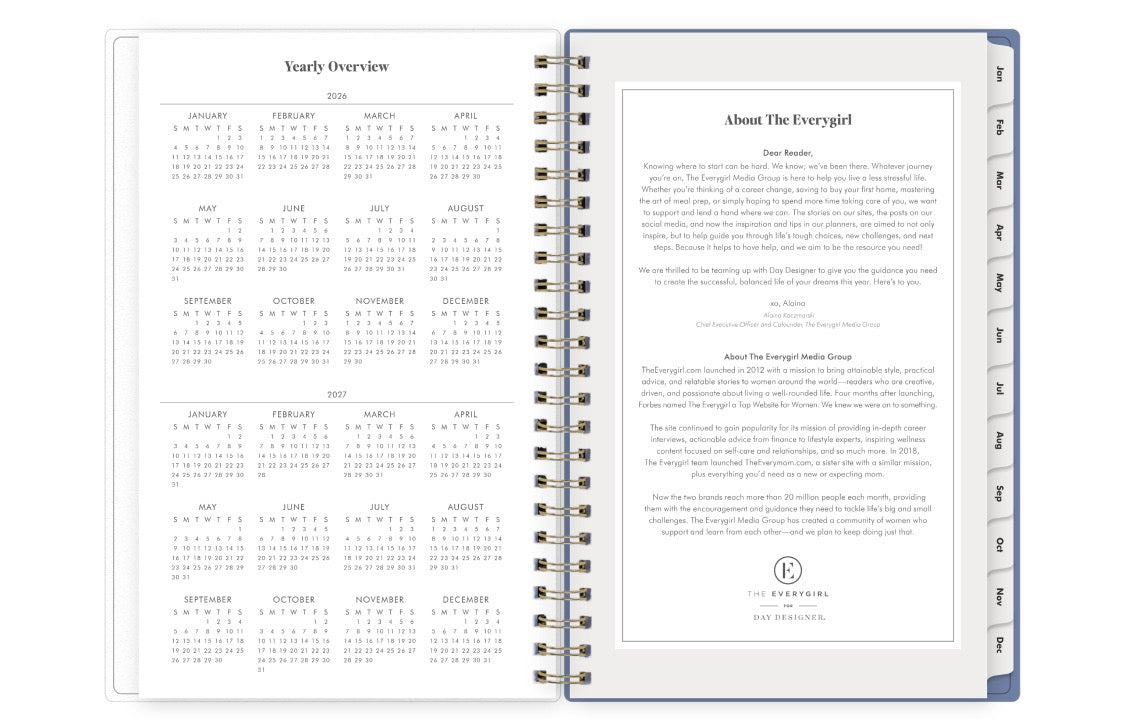 Open planner showing a yearly overview on one page and text on another, with &