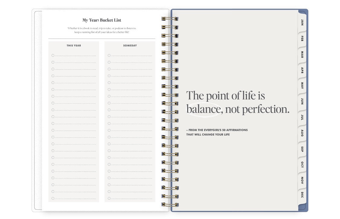 Open planner showing a quote about balance on one page and a bucket list on the other.