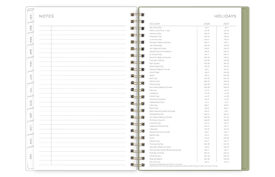 Spiral-bound planner with sections labeled &