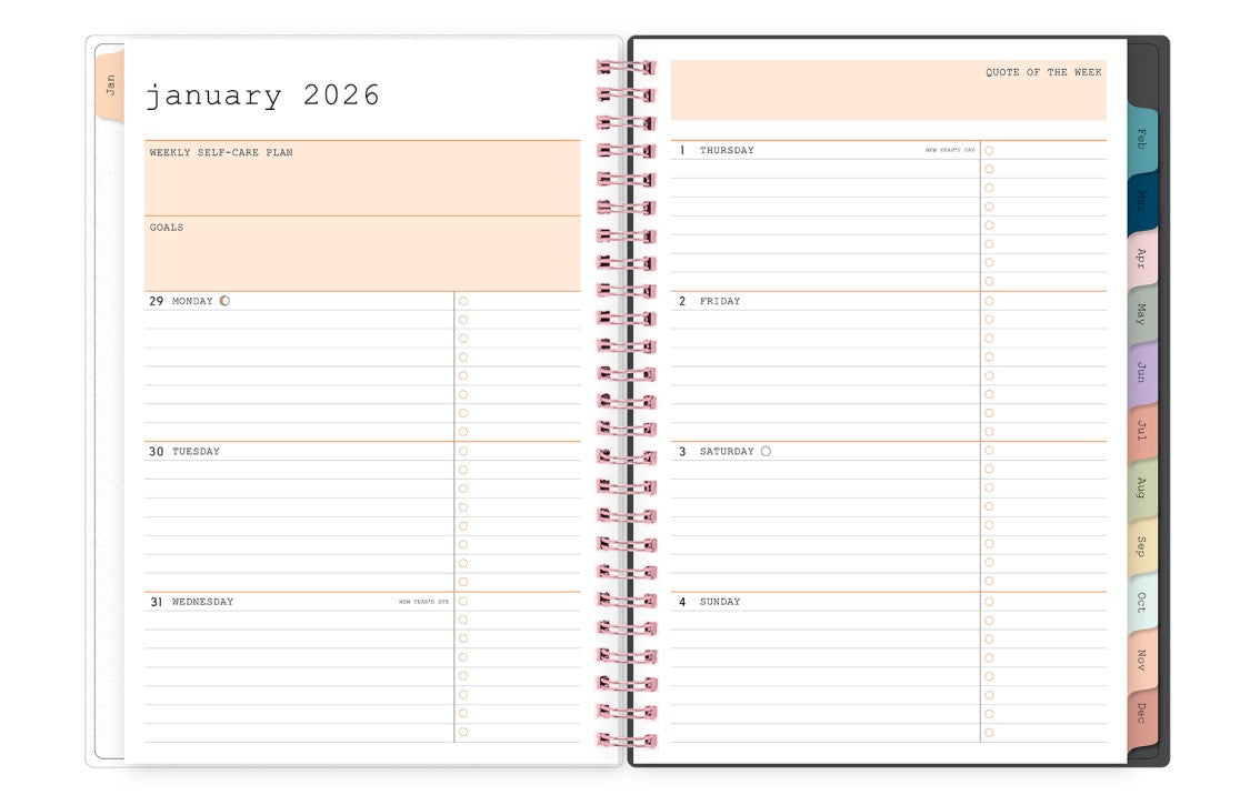 Open planner showing January 2026 with weekly layout and color-coded sections, lined writing space, bullet points, and multi color tabs