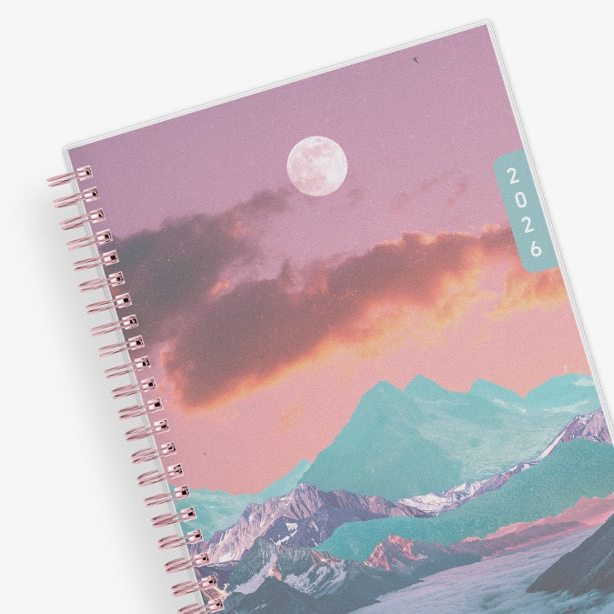 Spiral-bound planner with a mountain and moon design on the cover, featuring the year 2026 in 5.875x8.625