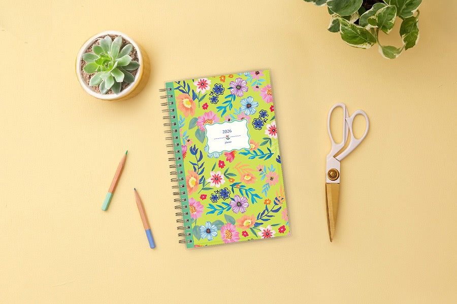 2026 planner featuring lime green back ground and floral front cover