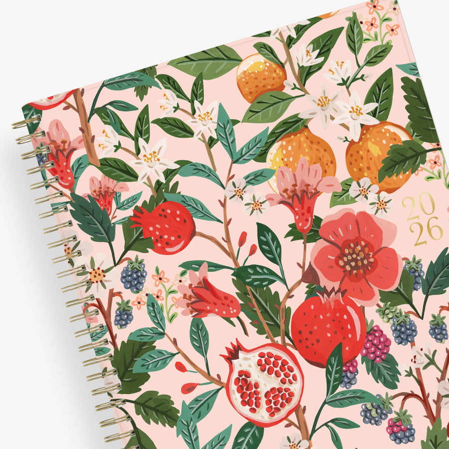 Spiral-bound 2026 planner with floral and fruit design on a pink background 8x10 size