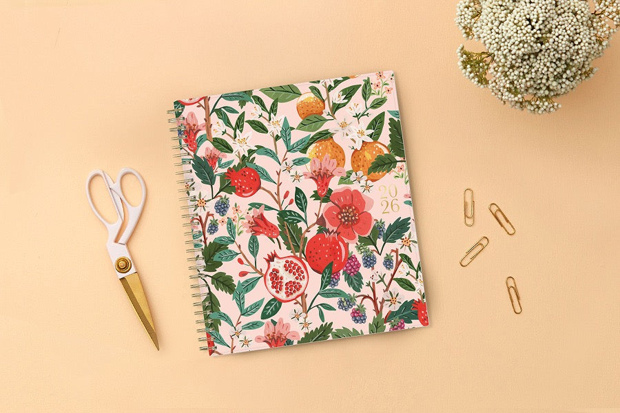 Spiral-bound 2026 planner with floral and fruit design on a pink background 8x10 size