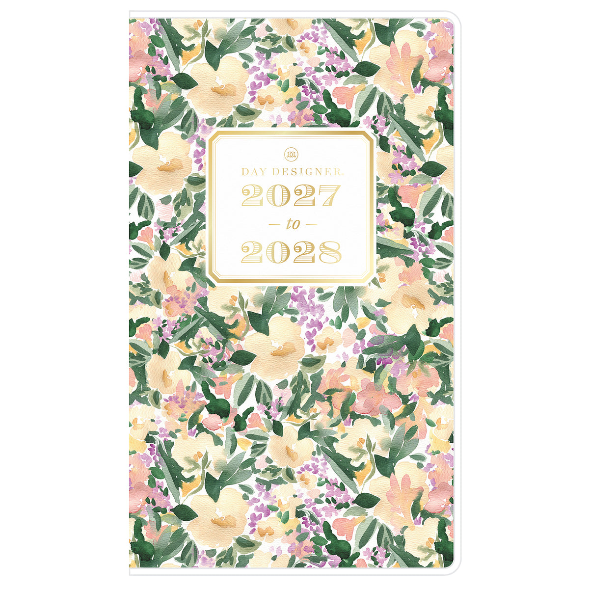 A tall daily planner with a watercolor floral cover pattern in green, pink, and cream, featuring a gold-bordered label in the center that reads &