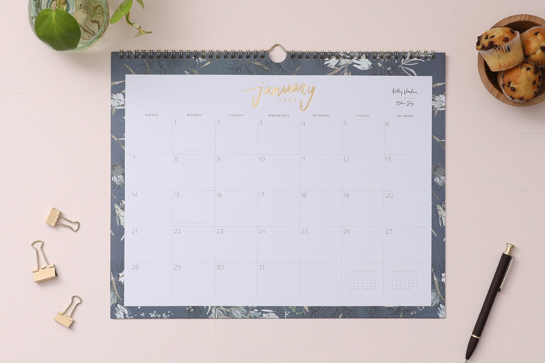 January 2024 - December 2024 monthly wall calendar featuring reference calendars and floral pattern border