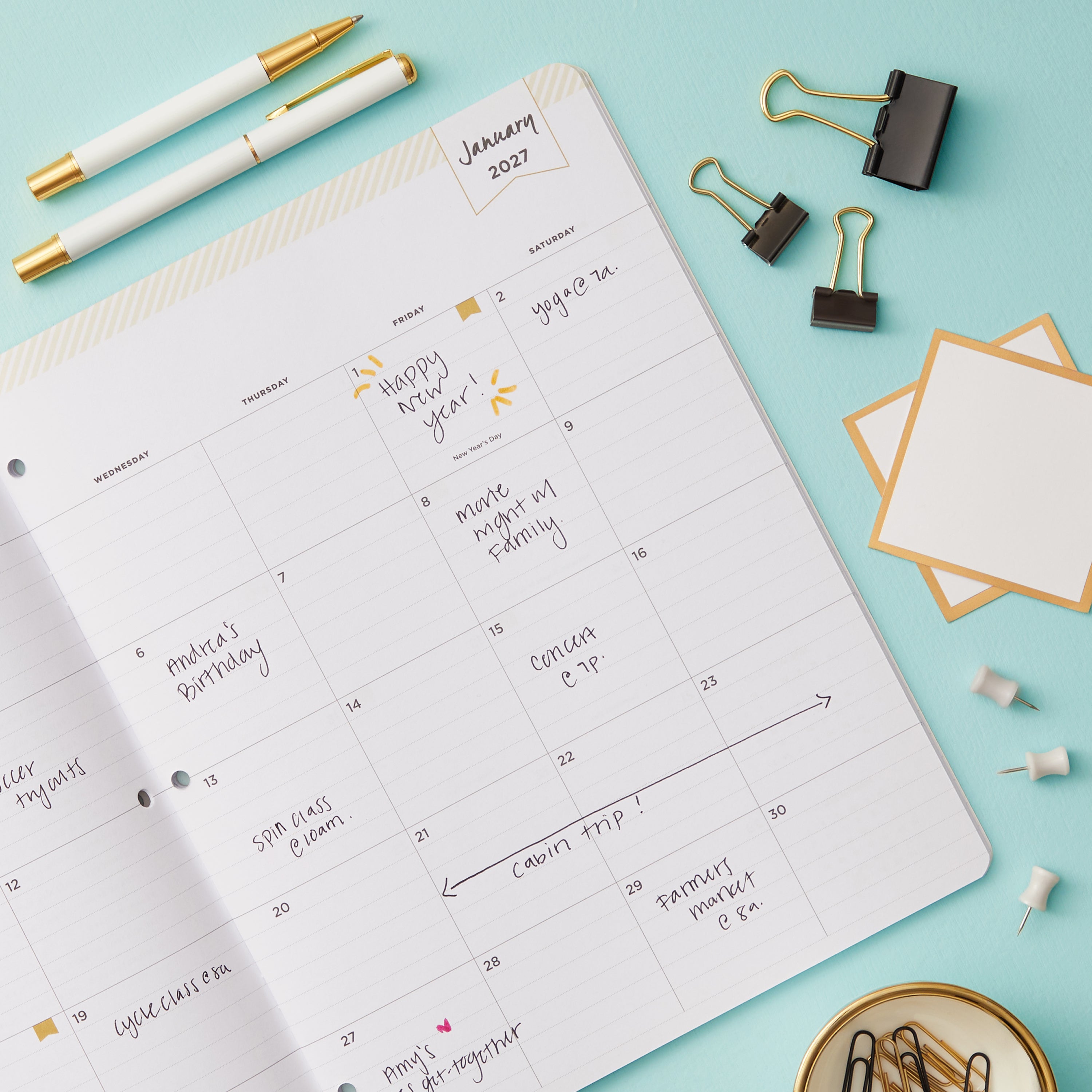 2027 monthly spread featuring ample lined writing space for each date, notes section, reference calendars, and monthly tabs