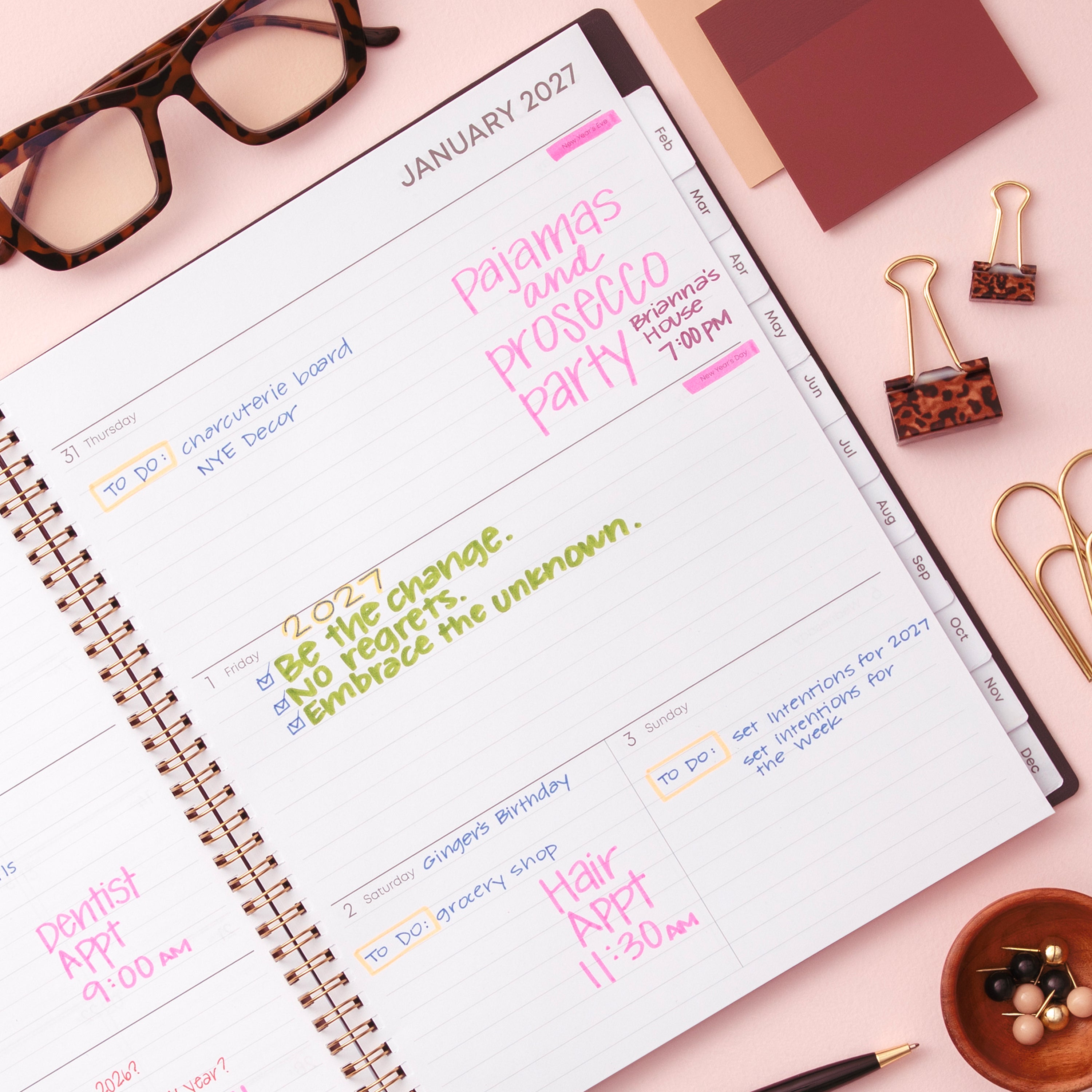 2027 weekly spread features ample lined writing space for to do lists, notes section, reference calendars, bullet points, and monthly tabs