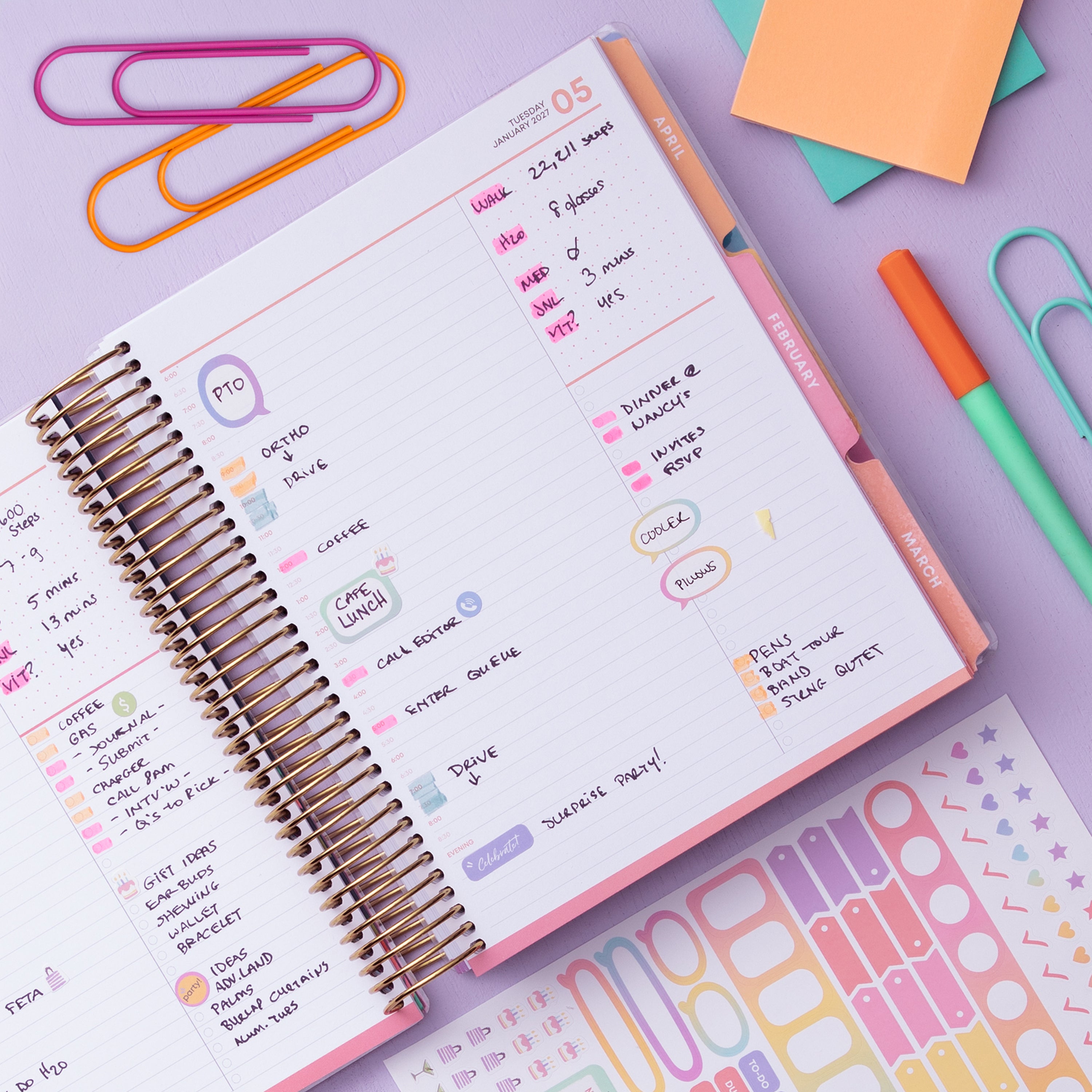 january 2027 to december 2027 daily monthly planner featuring daily spread with 1 hour increments, lined notes section, multi colored monthly tabs, and dot matrix for notes