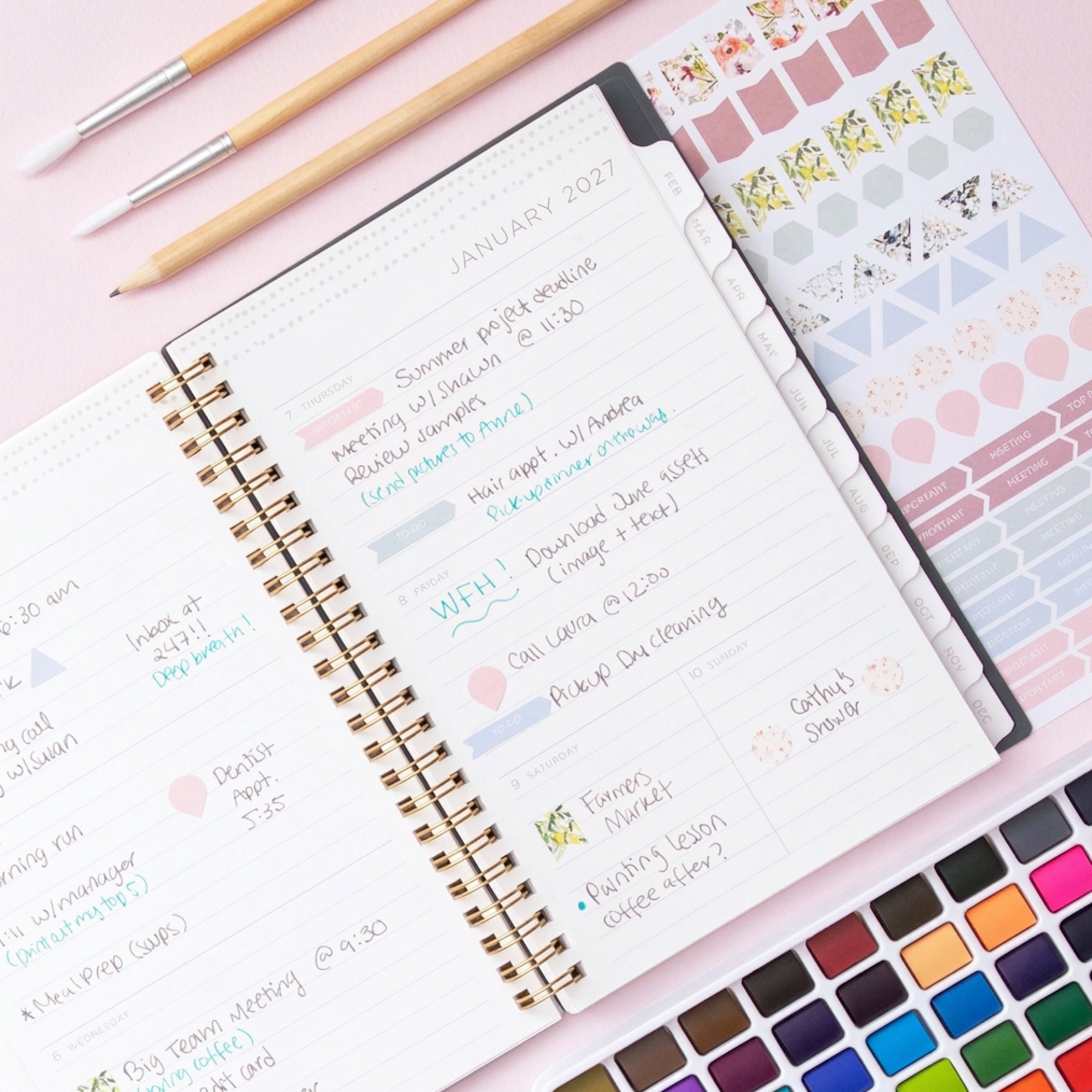 2027 weekly spread features ample lined writing space for to do lists, notes section, reference calendars, bullet points, and monthly tabs