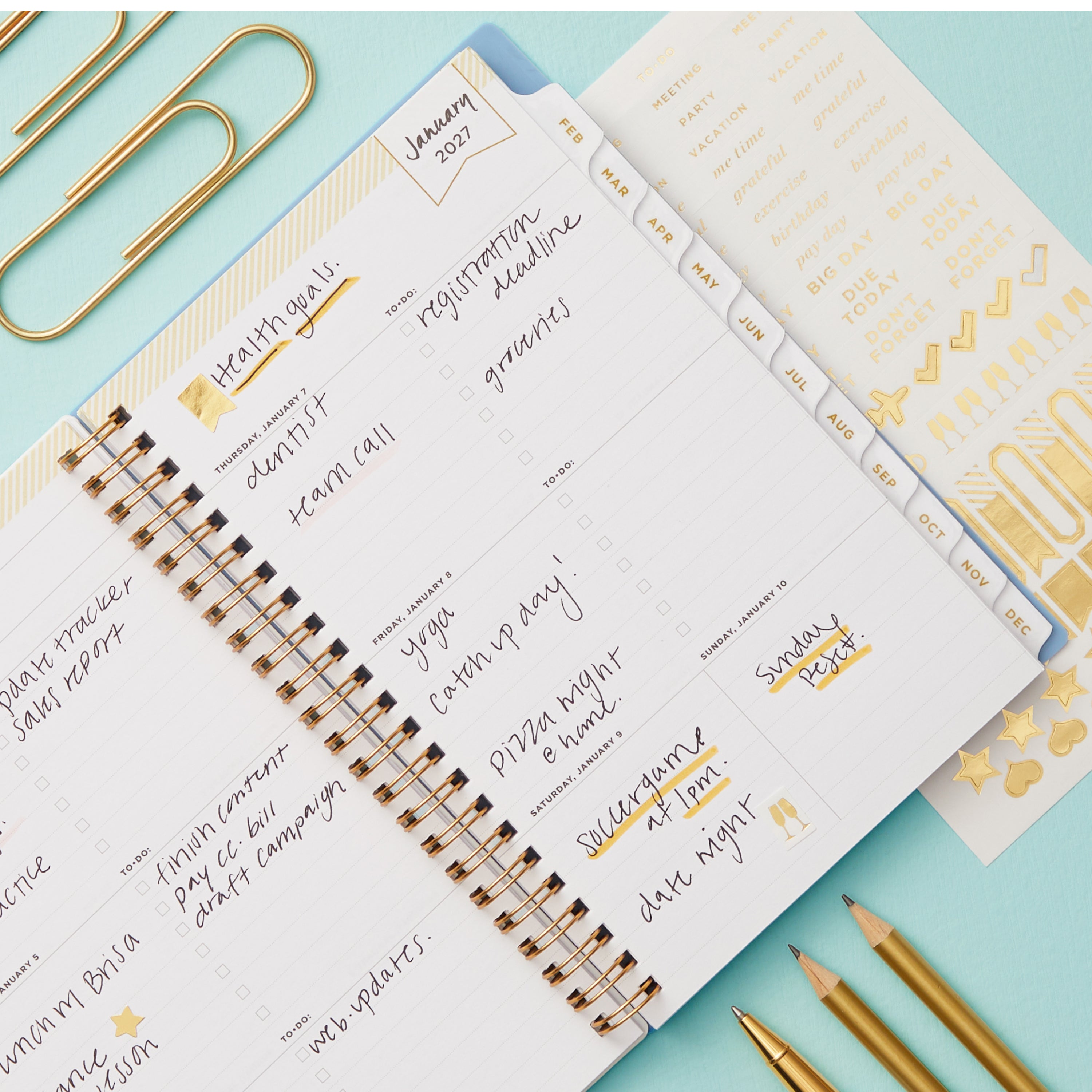 2027 weekly spread features ample lined writing space for to do lists, notes section, reference calendars, bullet points, and monthly tabs