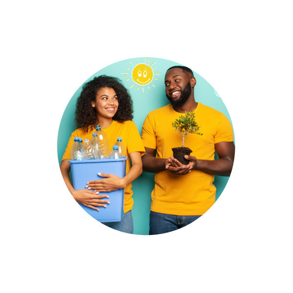 A young woman holding a recycling bin with plastic bottles and a young man holding a young tree plant in a vase