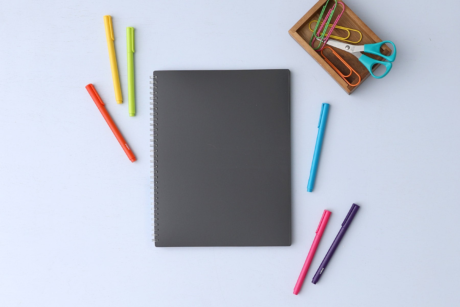 Blue Sky non-dated notebook in 8.5x11 size with ample lined writing space, graph paper format, subject, and dated text box with a charcoal flexible back cover.