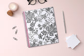 2025 weekly and monthly planner from Blue Sky featuring a floral pattern in black and white with twin silver wire-o binding and compact 8.5x11 size