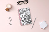 2025 weekly and monthly planner from Blue Sky featuring a floral pattern in black and white with twin silver wire-o binding and compact 5x8 size