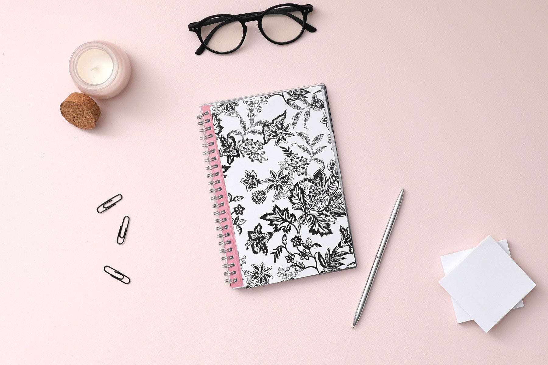 2025 weekly and monthly planner from Blue Sky featuring a floral pattern in black and white with twin silver wire-o binding and compact 5x8 size