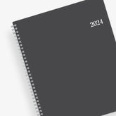 January 2024 - December 2024 weekly monthly planner featuring a charcoal front cover design and silver twin wire-o binding 8.5x11 size