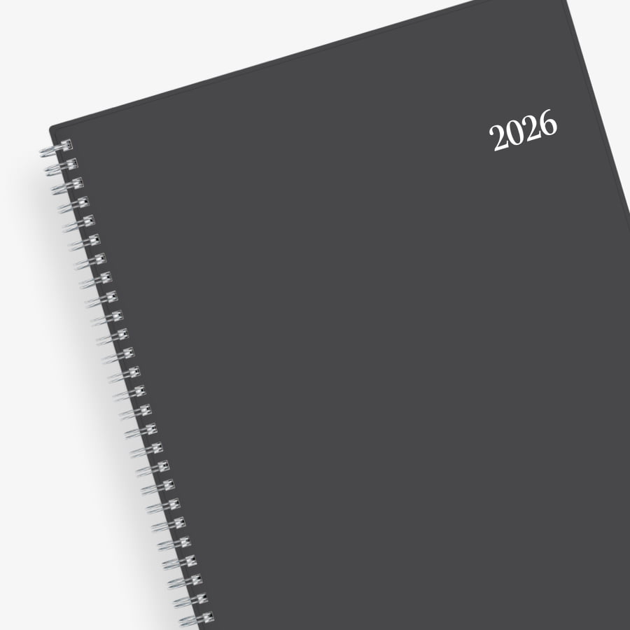 January 2026 - December 2026 weekly monthly planner featuring a charcoal front cover design and silver twin wire-o binding 8.5x11 size