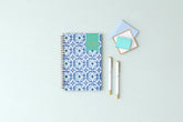 January 2025 - December 2025 weekly monthly planner featuring a geometric tile front cover design and silver gold wire-o binding 5x8 size