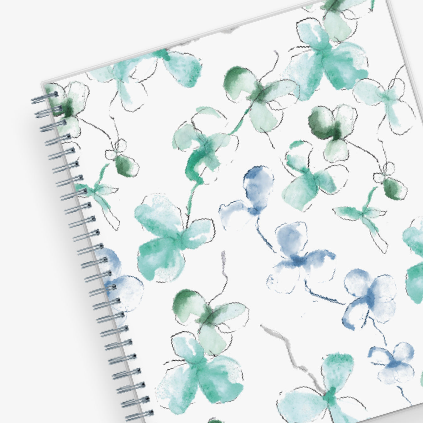 Plan way with this January 2024 - December 2024 monthly planner featuring a floral pattern front cover and twin silver wire-o binding