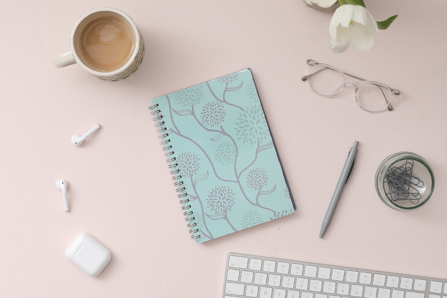 January 2025 - December 2025 weekly monthly planner featuring a floral front cover design and silver twin wire-o binding 5x8 size