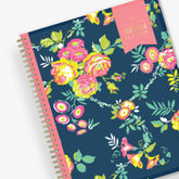 January 2024 - December 2024 weekly monthly planner in 8.5x11 size from day designer for blue sky with navy background and floral design, and gold twin wire-o binding