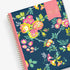 January 2024 - December 2024 weekly monthly planner in 8.5x11 size from day designer for blue sky with navy background and floral design, and gold twin wire-o binding