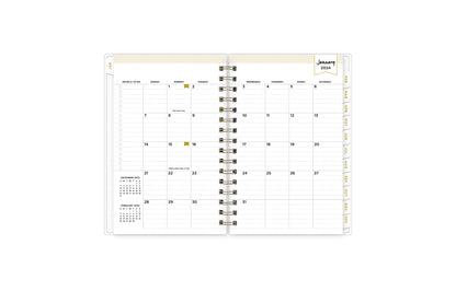 January 2024 - December 2024 daily monthly planner featuring a daily spread with lined writing space, notes and to-do list, one hour increments, and ample planning sections in a compact 5x8 size