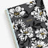 8.5x11 weekly monthly planner for January 2024 - December 2024 new year featuring silver twin wire-o binding, black/gray background, white florals and gold accents