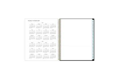 2024 and 2025 yearly overview on the 8.5x11 weekly monthly planner featuring blue monthly tabs, yearly goals, notes, and contact information.