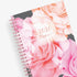 Take planning to the next level with this 2026 weekly monthly planner from Blue Sky featuring a cover with beautiful roses in shades of pink, rose gold twin wire-o binding in 5x8 planner size, and flexible front cover.