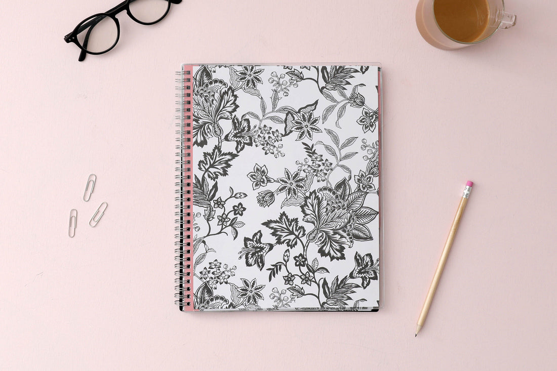 2024 monthly planner from Blue Sky featuring a floral pattern in black and white with twin silver wire-o binding and compact 8x10 size