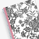 Monthly planner in 8x10 planner size with white background and black printed florals