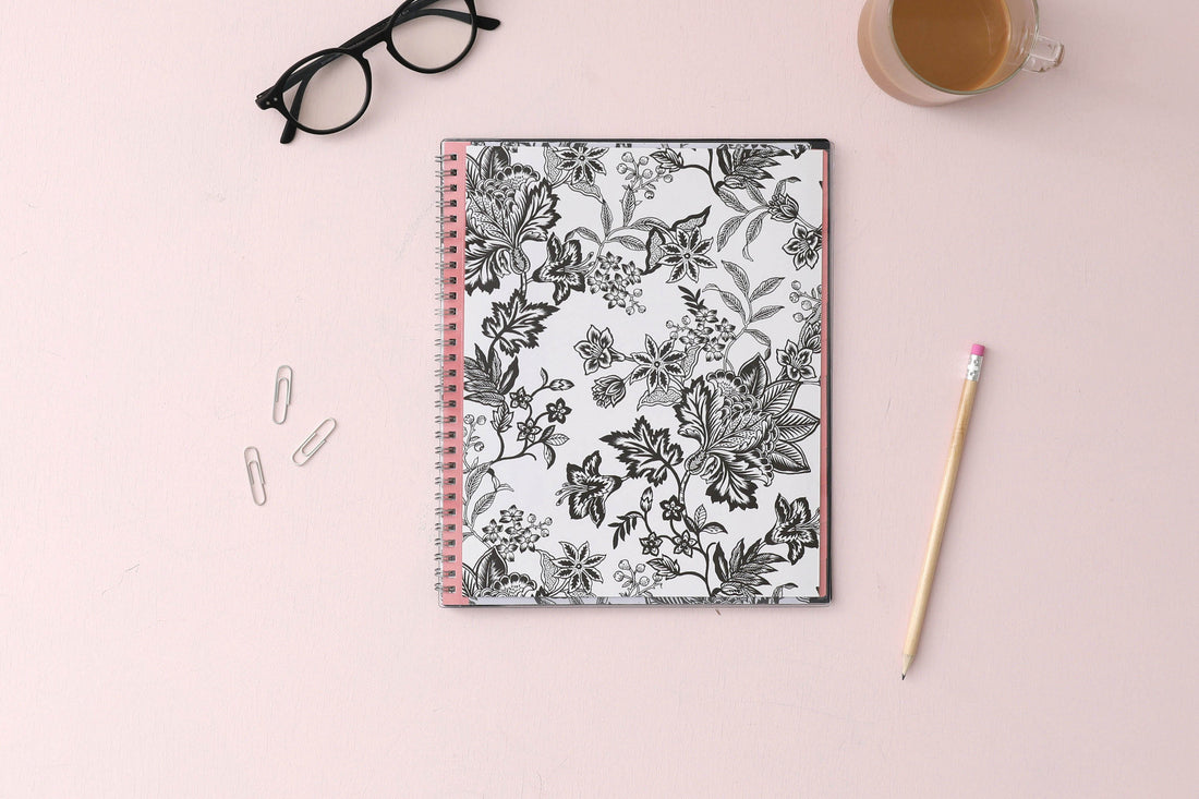 2024 weekly and monthly planner from Blue Sky featuring a floral pattern in black and white with twin silver wire-o binding and compact 8.5x11 size