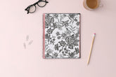 2024 weekly and monthly planner from Blue Sky featuring a floral pattern in black and white with twin silver wire-o binding and compact 8.5x11 size