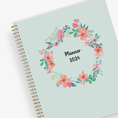 2024 weekly monthly planner in 7x9 size with mint background, gold binding and floral wreath