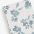 blue sky weekly monthly 2026 planner featuring blue water brushed florals and beige background cover